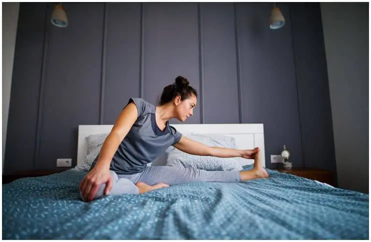 woman doing yoga before sleep