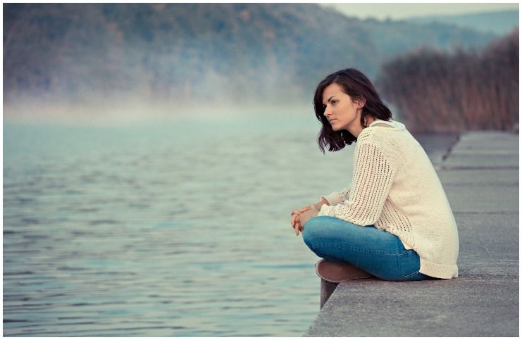 woman in nature lake