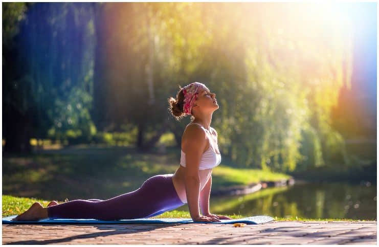 beautiful doing yoga in nature