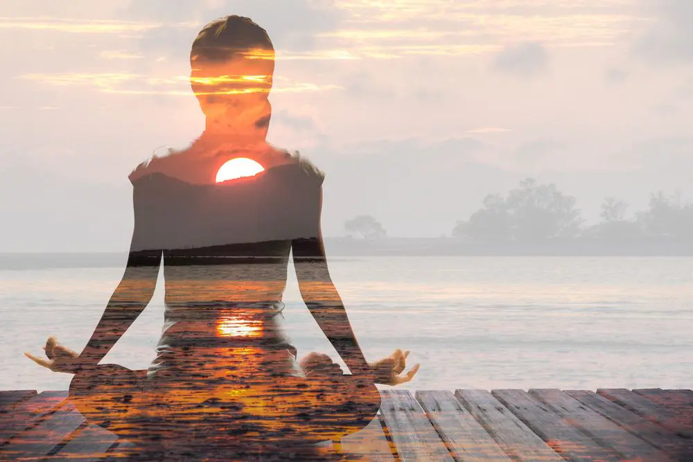 woman in a meditation sunrise